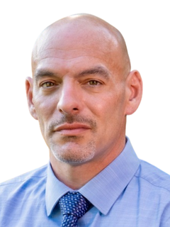 Dennis Durkin Jr. headshot