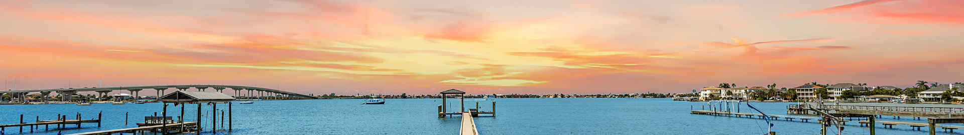Belleair, Florida neighborhood with upscale homes, tree-lined streets, waterfront properties, and close proximity to beaches, parks, shopping, and dining in Pinellas County.