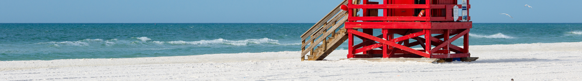 Siesta Key, Florida world-famous beach destination with powdery white quartz sand, turquoise Gulf waters, beachfront homes, resorts, dining, and vibrant coastal lifestyle near Sarasota.