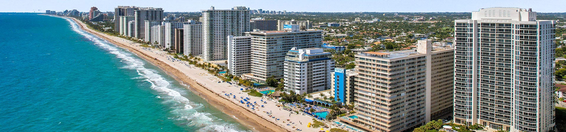 Luxury direct oceanfront condominium towers sitting directly on the sand along Galt Ocean Drive in Fort Lauderdale, represented by Prestige Waterfront Realty.