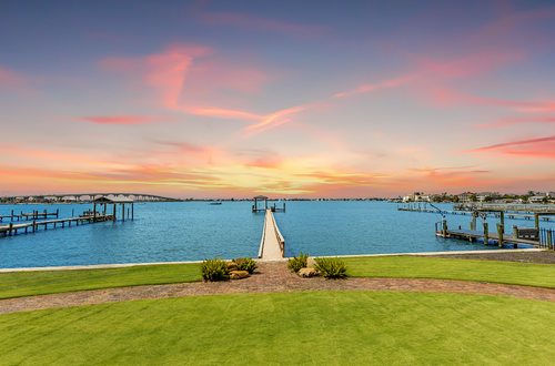 Belleair, Florida neighborhood with upscale homes, tree-lined streets, waterfront properties, and close proximity to beaches, parks, shopping, and dining in Pinellas County.