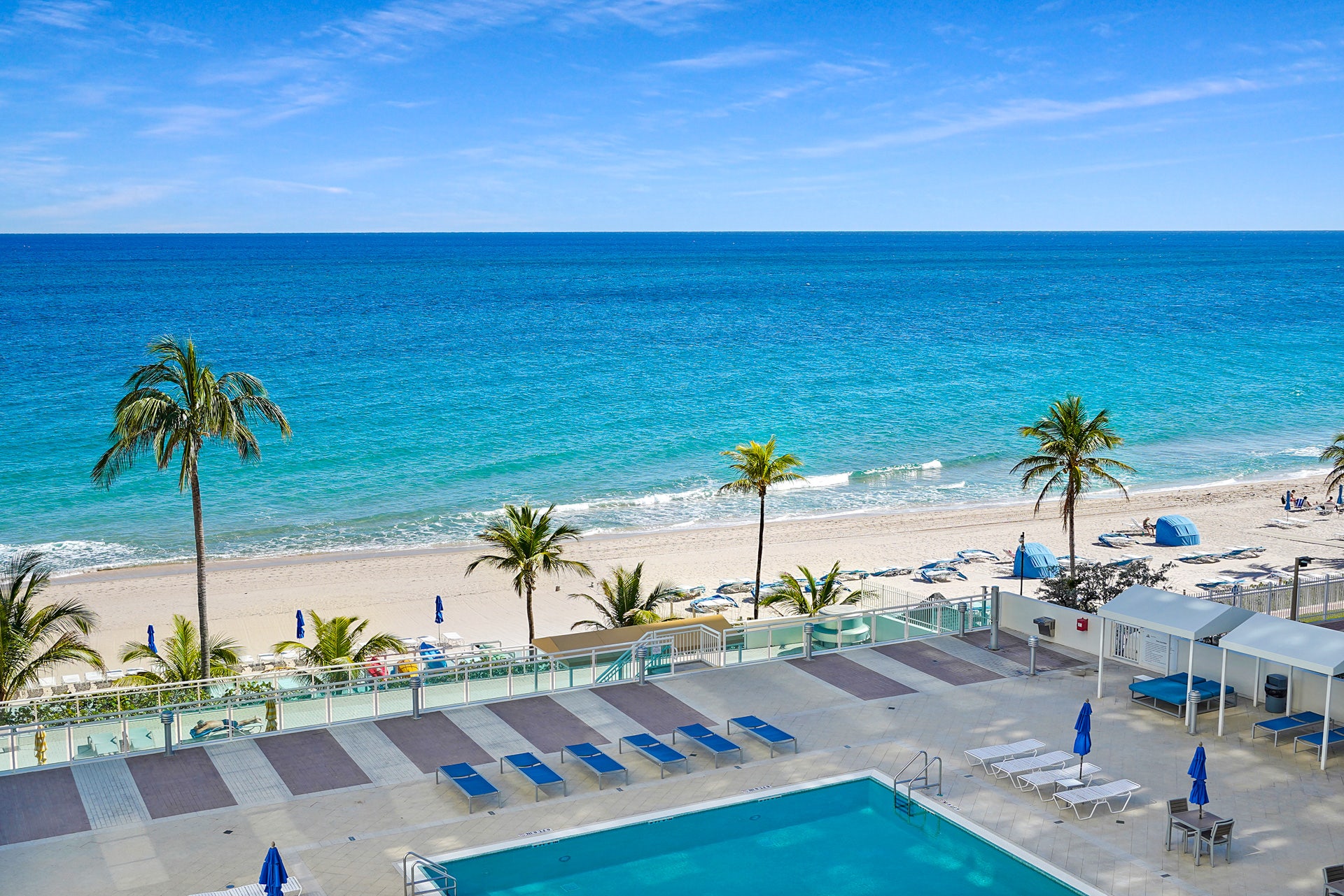 Enjoy resort-style living with stunning panoramic views of the pristine beach and sparkling pool deck from your luxury oceanfront condo at 3900 Galt Ocean Dr. Listed by Prestige Waterfront Realty. property photo of Enjoy resort-style living with stunning panoramic views of the pristine beach and sparkling pool deck from your luxury oceanfront condo at 3900 Galt Ocean Dr. Listed by Prestige Waterfront Realty.