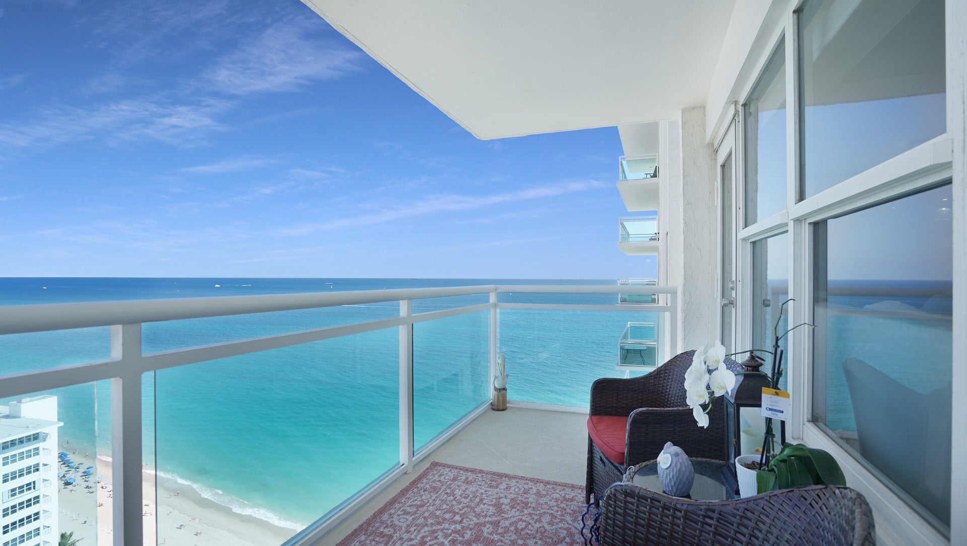 Relax and listen to the waves from your private glass-lined balcony. This spectacular vantage point offers direct, unobstructed ocean views, a hallmark of luxury Fort Lauderdale real estate. property photo for Relax and listen to the waves from your private glass-lined balcony. This spectacular vantage point offers direct, unobstructed ocean views, a hallmark of luxury Fort Lauderdale real estate.