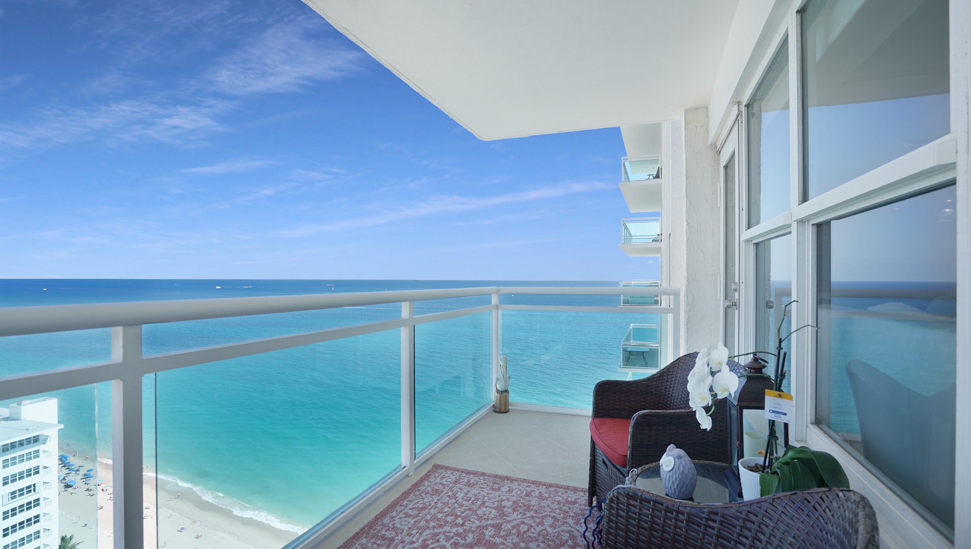 Relax and listen to the waves from your private glass-lined balcony. This spectacular vantage point offers direct, unobstructed ocean views, a hallmark of luxury Fort Lauderdale real estate. property photo of Relax and listen to the waves from your private glass-lined balcony. This spectacular vantage point offers direct, unobstructed ocean views, a hallmark of luxury Fort Lauderdale real estate.