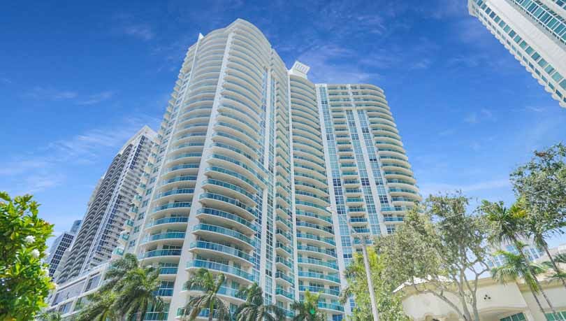 Stunning high-rise exterior view of the Watergarden in Fort Lauderdale, the premier choice for luxury waterfront living with Prestige Waterfront Realty.