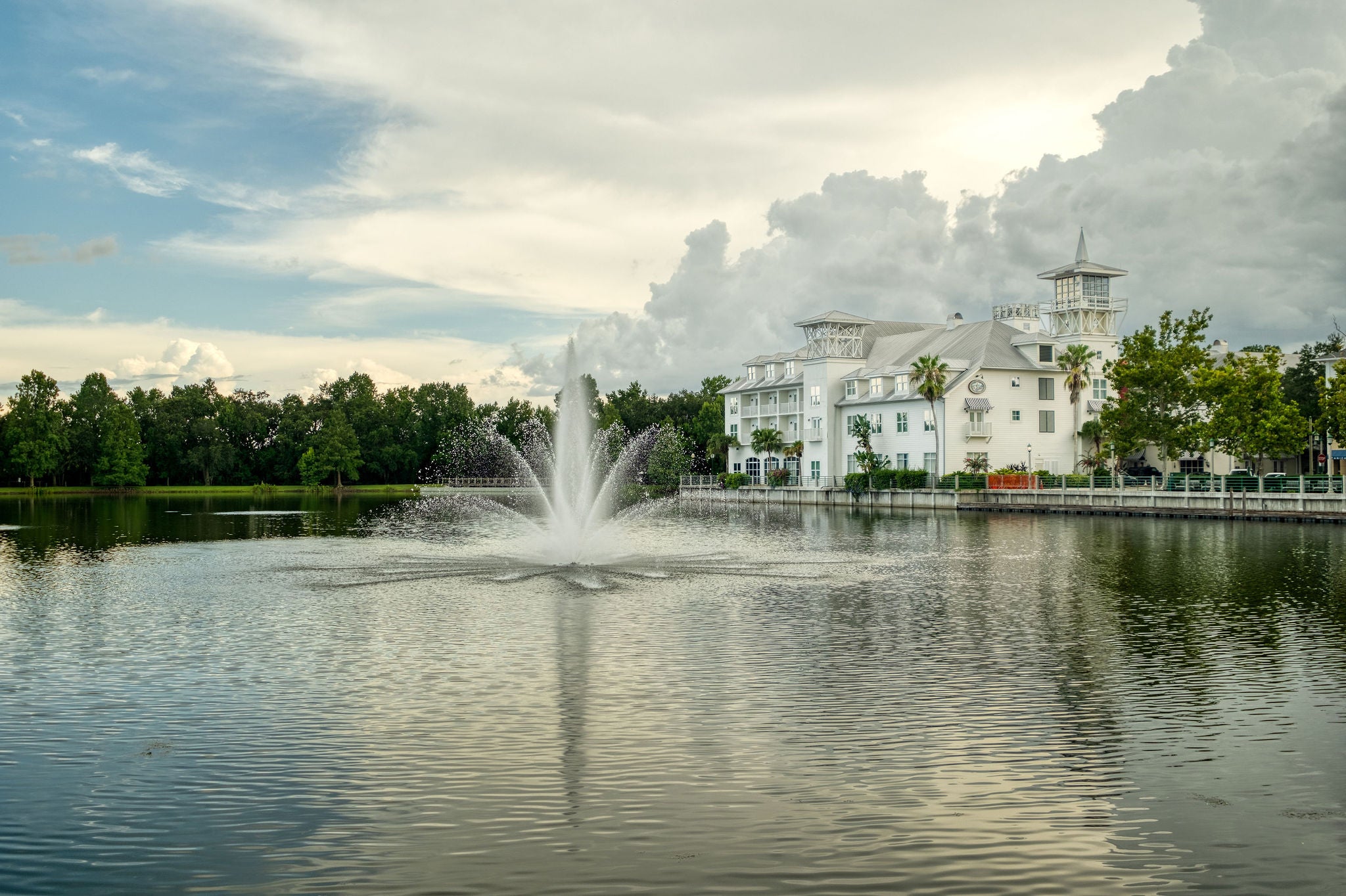 Tree-lined walking trail along the lake in Celebration, Florida, a walkable retirement community near Orlando