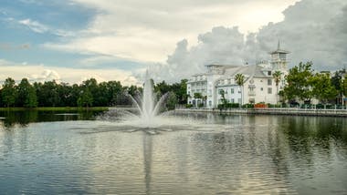 Is Celebration, FL a Good Place to Retire? An Honest Look Tree-lined walking trail along the lake in Celebration, Florida, a walkable retirement community near Orlando