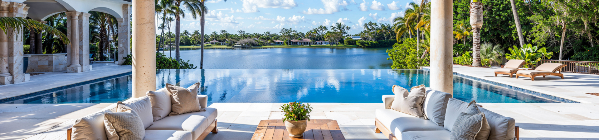 house exterior overlooking pool and water