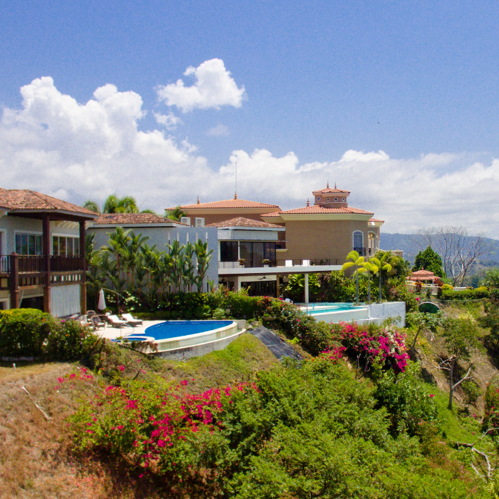 Luxury homes with pools and tropical gardens at Los Sueños Resort & Marina in Central Pacific Costa Rica.