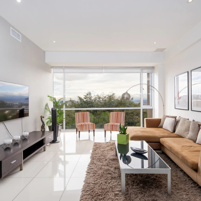 Priscila Lara Real Estate Agent in Costa Rica representing this luxury homes, luxury couch and bedroom in Escazú