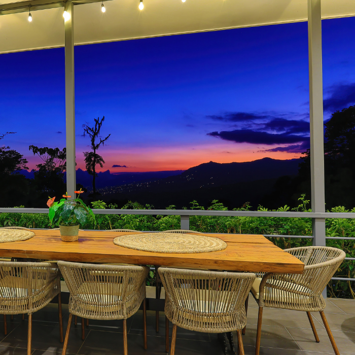 Outdoor dining area with valley view in Pérez Zeledón home