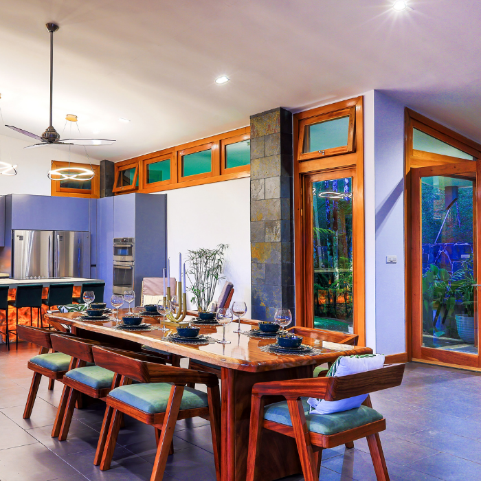 Dining room with wood table in Pérez Zeledón luxury villa