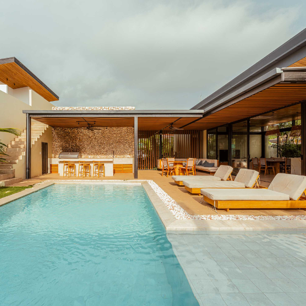 Modern luxury home with pool and outdoor lounge area in Costa Rica