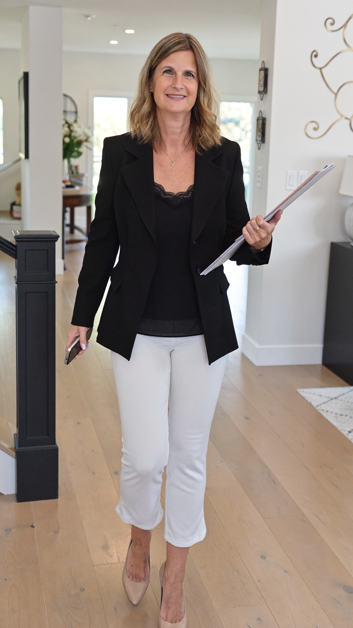 Nicole Schell standing at her desk